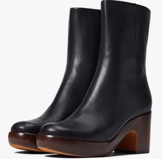 New Vince Women's Nicco Clog Mid Shaft Boots Calf Black Clogs With Lug Sole And Round Toe, Black Platform Clogs For Fall, Black Leather Clogs With Sculpted Heel, Fall Leather Clogs With Padded Heel, Leather Clogs With Padded Heel For Fall, Black Clogs With Wooden Heel For Fall, Black Block Heel Clogs For Fall, Fall Boots With Wooden Heel And Closed Toe, Black Fall Clogs With Reinforced Heel