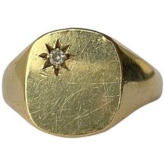 The design of this ring is fabulous! In the top corner of the main panel is a 7pt diamond set within a star setting. Fully hallmarked 1997 Birmingham, England. Ring Size: V 1/2 or 10 3/4 Widest Point: 14mm Weight: 8g Classic Star-shaped Jewelry With Single Diamond, Formal Star-shaped Single Diamond Jewelry, Vintage Star-shaped Anniversary Rings, Classic 14k Gold Star Shaped Signet Ring, Classic Star-shaped Signet Ring With Polished Finish, Classic Star Shaped Signet Ring With Polished Finish, Star-shaped Diamond Anniversary Ring With Accents, Classic Polished Star Shaped Signet Ring, Star-shaped Diamond Ring With Accents For Anniversary