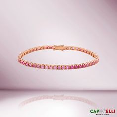 Beautiful Sapphire Tennis Bracelet. A staple in your jewelry collection. Handmade in Italy. This tennis Bracelet showcases a delicate box chain embellished with dozens of shimmering Pink Sapphires. Quality to us is important and that is why we hand select our diamonds for premium quality. ≫ Round Pink Shaded Sapphires : ◈ Carats: 11.50 ct. Carat (For 7 Inches Bracelet, other length will vary) ◈ 3.10mm Diameter *** Please consider 5% inaccuracies to the final product Romantic Colors Palette, Round Sapphire, Diamond Tennis Bracelet, Italian Jewelry, Pink Gemstones, Pastel Hues, Black Rhodium, Feminine Design, Fine Jewelry Collection