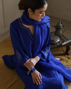 SITARA , in Cobalt Blue! This statement monotone ensemble is the star of the collection, LITERALLY ! 😍 Created it super lightweight pure silk, the surface is adorned by beautiful and delicate tone on tone floral embroidery details. The look is completed by hand-done mukaish organza dupatta. SHOP NOW AT finerthingsbyseerat.com #puresilk#luxuryfabrics#newcollection#indianwear#ethnicfashion#heritage#timelesstradition#ibtidaa#finerthingsbyseerat#embroiderydetails Cobalt Blue Saree, Pure Silk Suits, Designer Kurti Patterns, Traditional Indian Dress, Women Dresses Classy