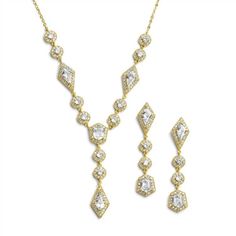 a gold necklace and earring set with cubicles on the sides, inlaid with diamonds