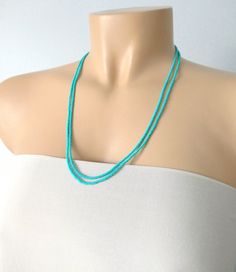 "This is a one strand beaded turquoise necklace, with NO CLASP, and can be worn in multiple ways, as shown in pictures. ❤ SIZES This item is one size fits all. ❤ PROCESSING AND SHIPPING Most orders are made and shipped out in one business day. Please check delivery timeframes for your location on the description below. ❤ CUSTOM ORDERS If you like this item in a different color, send me a message indicating: color, size and quantity needed. I will send you a link for a \"custom order\" and you'll Turquoise Multi-strand Jewelry With Tiny Beads, Turquoise Multi-strand Tiny Beads, Turquoise Multi-strand Beaded Necklaces With Tiny Beads, Turquoise Multi-strand Tiny Beads Necklace, Turquoise Multi-strand Beaded Necklaces, Turquoise Dainty Beaded Necklace, Turquoise Beaded Necklaces With Round Beads For Weddings, Turquoise Beaded Necklaces For Wedding With Round Beads, Turquoise Beaded Necklaces For Wedding