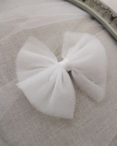 This listing is for soft tulle hair bow and shoe clips. Perfect for wedding, communion, birthday parties or any special events.Tulle bow is attached on grosgrain fabric bow on alligator clip or on a soft elastic nude nylon headband. Shoe clips will come in 1 pair of bow.DETAILS: X-Small Size: L 2.5" x W 2"Small Size: L 4" x W 3.5"Large Size: L 5.5” x W 4.5”Handmade in the USAImported Materials Tulle Hair Bows, Wedding Communion, Holiday Hair Bows, Tulle Bow, Tulle Bows, Bow Hair Clip, Holiday Hairstyles, Soft Tulle, Bow Shoes