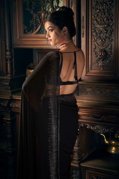 Buy Black Georgette Embroidered Crystals Plunged Border Saree With Blouse For Women by Seema Gujral Online at Aza Fashions. Elegant Georgette Choli For Evening, Elegant Black Saree With Mirror Work, Elegant Embellished Georgette Saree, Elegant Pre-draped Saree With Mirror Work For Evening, Elegant Black Pre-draped Saree With Mirror Work, Elegant Evening Blouse With Mirror Work, Elegant Black Choli For Evening Occasions, Elegant Black Georgette Choli, Glamorous Black Georgette Blouse Piece