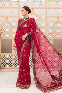 Embellished Bridal Wedding Dress in Red Saree Style is a breathtaking attire that is perfectly stitched. Lavish quality of the fabric and premium designs make this Bridal Dress an epitome of beauty and your foremost priority to have a head-turning look on the big day. Embellished Blouse: The beautiful blouse in premium raw silk fabric is perfectly stitched and it gives the Saree Dress a traditional look. Hand-crafted details of dabka, sequins, and kundan give a traditional touch to this blouse. Pengantin India, Celebrity Gowns, Saree Style, Raw Silk Fabric, Bridal Wedding Dress, Indian Bridal Dress, Maria B, Pakistani Bridal Dresses, Red Saree