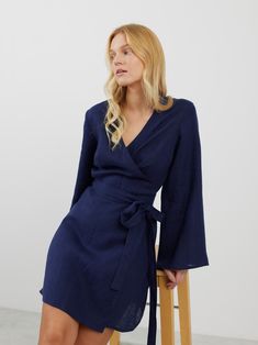 "LYDIA is a long sleeve true wrap closure linen wrap dress. DETAILS - True wrap closure - Long sleeves - Mini length - 100% lightweight European linen fabric - Cut and sewn to order just for you in our studio COLOR - Navy Blue, you can also choose other colors above - Fabric samples are available here https://www.etsy.com/listing/586569696/linen-fabric-samples SIZING & FIT - Fits true to size - Model is 5'8\" / 173cm and wearing a size S CARE FOR LINEN - Machine wash up to 30ºC/86ºF gentle cycle Spring Faux Wrap Maxi Dress, Linen Wrap Dress With Tie Waist, Summer Long Sleeve Wrap Dress With Tie Waist, Spring Brunch Wrap Dress, Long Sleeve Faux Wrap Dress For Work, Faux Wrap Long Sleeve Dress For Work, Wrap Dresses With Tie Fastening, Summer Long Sleeve Belted Wrap Dress, Belted Long Sleeve Wrap Dress For Summer