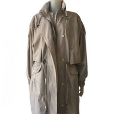 Beautiful 1980s vintage beige-sand-coloured women's/unisex transitional coat A mix between an oversized cocoon jacket and a trench coat Women's size approximately XL * mannequin is a size S and about 180 cm tall Fits men's size M-L, but please check the measurements also to make sure the sleeves are long enough (compare shoulder + sleeve length)  Length: 125 cm / 49.2 '' Shoulder to shoulder: 60 cm / 23.6 '' Sleeve length: 55 cm / 21.6 '' Width: 62 cm / 24.4 '' Material: 35 % cotton, 65 % polyes Oversized Long Outerwear In Neutral Color, Vintage Oversized Outerwear For Spring, Vintage Long Spring Outerwear, Vintage Long Beige Outerwear, Vintage Oversized Long Outerwear, Oversized Long Vintage Outerwear, Vintage Oversized Cream Outerwear, Cocoon Jackets, Trench Coats Women