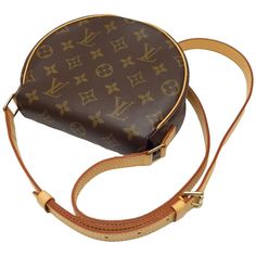 Introducing the Louis Vuitton Shoulder Bag Tamburan, a versatile and sophisticated accessory for the modern fashionista. Crafted from luxurious Monogram Empreinte leather, this bag exudes elegance and style. The spacious interior is perfect for carrying all your essentials, while the adjustable shoulder strap allows for comfortable wear.The Tamburan features a sleek design with a flap closure and gold-tone hardware, adding a touch of glamour to any outfit. Whether you're heading to a business me Timeless Luxury, Business Meeting, Louis Vuitton Shoulder Bag, Everyday Look, Sleek Design, The Modern, Fashion Forward, Night Out, Shoulder Strap