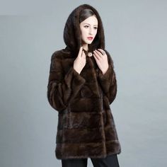 Looking for a warm jacket that not only keeps you cozy but also adds a touch of style to your winter look? Look no further than these fashionable women's jackets. Crafted from genuine leather and mink fur, they offer both warmth and a trendy look. Featuring an eye-catching striped pattern and a fur-trimmed hood, they're perfect for elevating your winter style.Specifications Type: Wide-waisted Thickness: STANDARD Style: Thick Warm Fur Style: Casual Sleeve Style: Regular Sleeve Length(cm): Full Season: Winter Pattern Type: striped Outerwear Type: Real Fur Origin: Mainland China Model Number: TT-01 Material: Fur,Genuine Leather,Mink Fur Hooded: Yes Gender: WOMEN Fabric Type: Silk Cotton Decoration: Fur Craft\Technics: Full Pelt Collar: With Fur Trim Hood Clothing Length: Medium Closure Type: Warm Fur Coat For Fall And Cold Weather, Long Sleeve Fur Coat For Winter, Warm Fur Coat For Cold Weather In Fall, Fur Coat For Cold Weather In Fall, Hooded Warm Fur Coat For Fall, Hooded Mink Outerwear For Cold Weather, Hooded Mink Color Outerwear For Cold Weather, Hooded Brown Fur Coat For Fall, Long Mink Coat For Fall