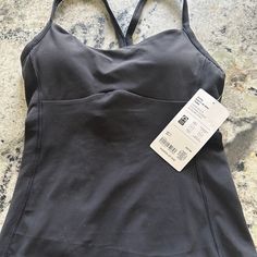 Nwt Athleta Vital Built-In Bra Tank. Paid $59, Missed Return Window Sports Tank Top With Built-in Padding, High Stretch Tank Straps Activewear For Sports, High Stretch Tank Strap Activewear For Sports, High Stretch Sports Activewear With Tank Straps, Casual Activewear With Built-in Padding For Gym, Fitted Tank Top With Light Support For Sports, Athleisure Black Sports Bra With Tank Straps, Sports Tank Activewear With Bra-friendly Straps, Black Athleisure Sports Bra With Tank Straps