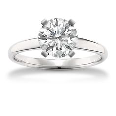 a round cut diamond engagement ring in white gold