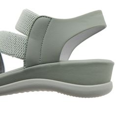 The Siketu Carmela Cushioned Footbed Sandal in black is the perfect choice for a comfortable and stylish summer look. The cushioned footbed provides all-day support and the light sage color will easily match any outfit. Step into comfort and style with these sandals. 1.57'' heel Pull-on PU upper Synthetic Arch support footbed™ Cushioned Insole™ Anti-skid rubber sole Comfortable Sandals With Ortholite Insole For Vacation, Comfortable Open Toe Sandals, Lightweight Sandals With Arch Support For Spring, Lightweight Spring Sandals With Arch Support, Cushioned Wedge Sandals With Synthetic Material, Comfortable Synthetic Wedge Sandals With Cushioned Footbed, Comfortable Synthetic Slingback Sandals With Round Toe, Comfortable Open Toe Synthetic Footbed Sandals, Comfortable Cushioned Synthetic Wedge Sandals