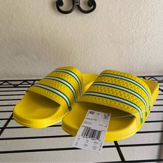 Adidas Originals Adilette Trefoil Slides Gx9895 Mens Size 10 Yellow Green New Brand New With Tags Packages Are Usually Shipped Within 3 To 5 Business Days. Everything You See In The Photo You Will Get In The Same Condition You See It In. Our Number One Focus Is 100% Customer Service, So Please Don’t Hesitate To Send Offers Need More Pictures? Dm Me We Answer Within 12 Hours. Yellow Synthetic Flat Sneakers, Yellow Adidas Synthetic Sneakers, Adidas Yellow Synthetic Sneakers, Yellow Adidas Sneakers Synthetic, Adidas Yellow Sneakers For Spring, Yellow Flat Sporty Sneakers, Sporty Yellow Flat Sneakers, Yellow Non-slip Synthetic Sneakers, Yellow Non-slip Sneakers For Summer