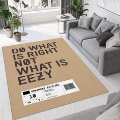 a living room with a large rug that says do what is right not what is eezy