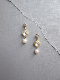 Fine pearl drop and Swarovski crystal earrings, Swarovski crystal bridal earrings, Dangling earrings Elegant Gold Crystal Earrings With Pearl Charm, Gold Pearl Crystal Earrings For Wedding, Gold Diamond Earrings With Pearl Drop For Wedding, Elegant Gold Earrings For Mother Of The Bride, Delicate Gold Crystal Earrings With Pearl Drop, Gold Dangle Diamond Earrings With Pearl Drop, Gold Diamond Dangle Earrings With Pearl Drop, Delicate Gold Diamond Earrings For Wedding, Delicate Gold Earrings For Mother Of The Bride