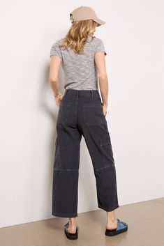 Add the Jericho Pant by AGOLDE to your utility collection. Crafted in a comfortable cotton canvas material, these pants feature a high-rise fit, four-pocket styling, pleats at the front, and cargo pockets on the outseams. Style these with your favorite graphic tee, sneakers, and baseball cap for an effortlessly chic look. | AGOLDE Women's Jericho Pants, Size 25, Black High-waisted Cotton Cargo Work Pants, Cotton Cargo Jeans With Pockets For Workwear, Relaxed Fit Cargo Pants For Work With Belt Loops, Cotton Workwear Cargo Jeans, Utility Style Wide Leg Washed Black Pants, Washed Black Wide Leg Utility Pants, Loosely Fitted High-waisted Cotton Work Pants, Cotton Utility Pants With Cargo Style, Cotton Cargo Pants With Tapered Leg In Utility Style