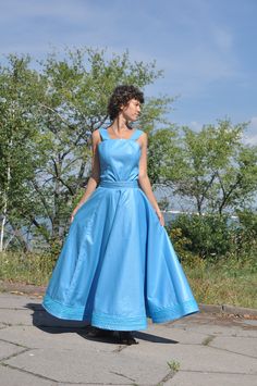 Blue skirt for whirling. 100% polyester. Heavy duty material, water proof. Glossy look. Made to measure Time to process your order - 2 weeks plus 2-3 weeks for standard shipping. Faster shipping is available for extra fee - please inquire.. To start we'll need: - your waist size (How to correctly measure your waist: http://www.wikihow.com/Measure-Your-Waist); - the length of the skirt (our recommendation for the optimal whirling: length from your waistline to floor minus 10 cm or 4 inches); - yo Fitted A-line Maxi Skirt With Gathered Detail, Blue A-line Dress With Lined Skirt, Blue Dresses With Flowy Flared Skirt, Blue Flared Dress With Flowy Skirt, Blue Flared Skirt Dress With Flowy Fit, Blue Flared Evening Dress, Blue Flared Skirt Evening Dress, Blue Flared Dress, Fitted Dresses With Gathered Flared Skirt