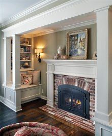 a living room filled with furniture and a fire place