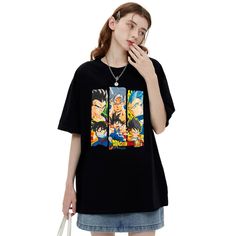 Perfect for any anime fan, this t-shirt is a must-have addition to your wardrobe. The American-style trend and retro print give it a unique and cool look that will make you stand out in a crowd. Whether you're attending a convention, hanging out with friends, or just lounging at home, this t-shirt is the perfect choice for any occasion. Black Anime T-shirt With Front Print, Fandom Graphic Print T-shirt For Streetwear, Trendy Anime Print T-shirt For Streetwear, Harajuku Black Graphic Print T-shirt, Harajuku Style Black Graphic T-shirt, Harajuku Style Black T-shirt With Graphic Print, Black Harajuku Style Graphic T-shirt, Pop Culture Cartoon Print T-shirt For Streetwear, Trendy Black T-shirt With Cartoon Print