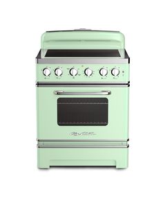 a green stove top oven sitting next to a white wall