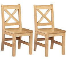 two wooden chairs sitting next to each other