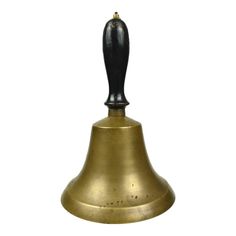 an antique brass bell on a white background