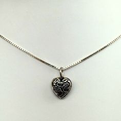 "This antiqued sterling silver, two-sided, repousse Puffy Heart Charm Number 8 features a flowering tree in full bloom. Marked, Sterling. Made by Brown County Silver. Vintage and in new, never worn condition. Approximately 30 years old. 3/4\" high with jump ring 1/2\" wide 1.3 grams approx. *Chain sold separately See more @ https://www.etsy.com/shop/brocosi" Vintage Heart Necklace, Flowering Tree, Brown County, Puffy Heart Charms, Vintage Silver Jewelry, Heart Charm Necklace, Gift Girlfriend, Silver Heart Pendant, Dope Jewelry