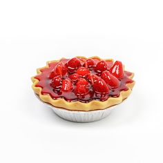 a pie with some strawberries on top of it