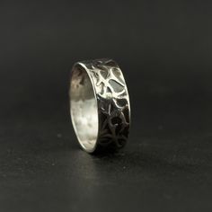 Slim Version inspired by the the wide Family Ring Every Shadowhunter family has a symbol, and the symbols are often worn on family rings. The symbol of the Blackthorns is a pattern of thorny branches. Sterling silver, featuring an old world distressed oxidized finish.5/16" - 8mm Don't know your ring size? check it here. We also carry and inexpensive finger sizer Available to ship in 5-7 business days Classic Handmade Engraved Ring For Promise, Classic Handmade Engraved Promise Ring, Family Symbol, Family Ring, Family Rings, Stylish Rings, Wide Bands, Old World, Elegant Design