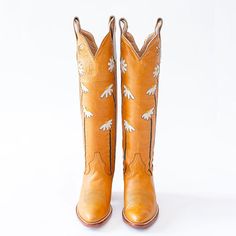 The Orange Lovely Chunky Heel Shoes are mid-calf western flower cowboy boots that combine style and comfort. Stand out with their vibrant color and chunky heel design. Color: Orange Heel Type: Chunky heel Heel height: 2.36" / 60 mm approx Product measurements were taken using size 8. Please note that measurements may vary by size. Toe: Pointed toe Floral pattern embroidery Handcrafted US sizing. Fits true to size. Bohemian Style Boots For Ranch In Spring, Bohemian Style Ranch Boots For Spring, Western Mid-calf Summer Boots, Spring Ranch Mid-calf Snip Toe Boots, Spring Knee-high Heeled Boots For Ranch, Summer Western Knee-high Boots, Western Knee-high Summer Boots, Western Style Knee-high Summer Boots, Bohemian Snip Toe Boots For Spring