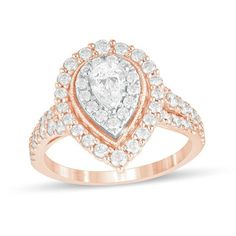 Shimmering with vintage inspiration, this diamond engagement ring complements her romantic style. Crafted in 14K rose gold, this enchanting look features a 3/8 ct. pear-shaped diamond wrapped in a frame of diamonds and an intricate milgrain border. An open halo of multi-sized diamonds surrounds the center while the split shank glistens with diamonds. Captivating with 1-1/2 cts. t.w. of diamonds and a bright polished shine, this engagement ring reflects your love story. Pear-shaped Rose Gold Ring For Proposal, Rose Gold Pear-shaped Ring With Brilliant Cut, Rose Gold Pear-shaped Diamond Ring With Prong Setting, Pear-shaped Rose Gold Diamond Ring With Halo Setting, Elegant Rose Gold Pear-shaped Diamond Ring, Elegant Pear-shaped Rose Gold Diamond Ring, Formal Rose Gold Pear-shaped Diamond Ring, Vintage Style Engagement Rings, Double Frame