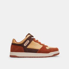 Inspired by traditional court shoes our C201 sneaker is crafted in a mix of distinctive corduroy velvety suede and smooth leather. The versatile low-top features a grooved sole for great traction. | Coach C201 Sneaker Size 7 - Honey Brown/tan Retro Brown Low-top Sneakers, Retro Low-top Suede Sneakers, Coach Low-top Sneakers With Rubber Sole, Coach High-top Sneakers With Rubber Sole, Coach Low-top Sneakers For Streetwear, Coach Sneakers For Streetwear With Round Toe, Coach Low-top Sneakers With Textured Sole, Casual Coach Sneakers With Contrast Sole, Casual Coach Sneakers With Textured Sole