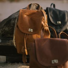 Handcrafted slowly and ethically from our small studio based at the foothills of the Himalayas. The Mini Foldover Backpack is designed to carry your essentials with ease. Whether it’s tackling a new adventure or marking things off your bucket list, this backpack is guaranteed to be your perfect companion. PRODUCT DETAILS: Size: L - 7”, H - 9”, D - 4”, adjustable straps - 36” Materials: recycled leather Lining: hand block printed cotton canvas Print: mini diya Care: spot clean only with soft, cle Adventure Leather Backpack With Adjustable Strap, Natural Color Standard Backpack For Travel, Standard Backpack With Adjustable Strap For Adventure, Adventure Leather Backpack With Leather Handles, Natural Color Backpack With Adjustable Strap, Natural Backpack With Adjustable Strap, Natural Color Travel Backpack, The Himalayas, New Adventure