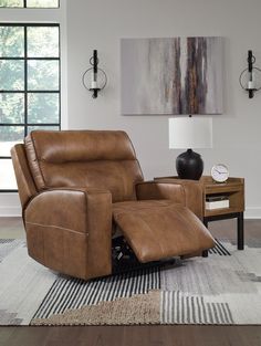 a living room with a brown recliner chair