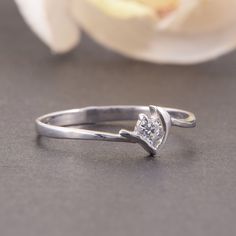 "Solitaire promise ring, Tiny ring, Dainty ring, Elegant ring, Silver ring for her, Promise ring for her, Geometric ring, Unique silver ring WE OFFER UNLIMITED PERIOD INSTALLMENTS PLAN This is a beautiful, stunning, feminine ring that works well for all occasions, styles, and ages. You will love it! Ring information Main stone: White cubic zirconia Approximate size: 3.0mm Metal type: Silver Metal stamp: 925 Sterling SIlver Customization / Replacements It's easy to create jewelry that's perfect f Silver Stackable Promise Rings With Single Diamond, Silver Stackable Rings With Single Diamond For Promise, Silver Ring With Single Diamond As Gift, Silver Ring With Single Diamond For Gift, Silver Dainty Ring With Single Diamond, Silver Birthstone Ring With Single Diamond For Gift, Silver Rings With Single Diamond As Gift, Adjustable Silver Ring With Single Diamond, Minimalist Silver Promise Ring With Birthstone