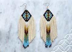 Native beaded fringe brick stitch earrings. Artisan White Earrings With Beaded Fringe, White Bohemian Rectangular Earrings, Bohemian White Rectangular Earrings, Artisan White Fringe Jewelry, Native American Quilt Patterns, Native American Quilt, Native Print, Stitch Earrings, American Quilt