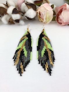 "Abstract gold and neon green beaded earrings, statement boho earrings, colorful seed beaded earrings Length 5\" including ear wire Width 1\" Made with best quality Japanese seed beads and 24k gold dipped seed beads Lightweight and unique extravagant style - designed and made by Luba Ro Colors used - black, gold, matte gray, neon green, blue rainbow zircon Select closure earwires leverbacks clip-ons for non pierced ears" Green Beaded Drop Earrings, Bohemian Green Earrings With Gold Beads, Unique Green Beaded Earrings For Party, Unique Green Beaded Party Earrings, Handmade Green Tassel Earrings For Festival, Green Beaded Earrings For Festival, Summer Green Earrings With Tiny Beads, Handmade Lime Green Bohemian Jewelry, Handmade Green Beaded Earrings For Festivals