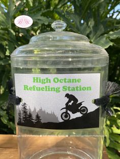 a clear jar with a label on it that says high octane retrieving station