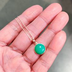 You can choose your own gem in my store. Let me know if you would like to see options Details of the pendants: Chrysoprase pendant Stone Weight: 7.10 carats Stone size and shape: 12 mm and round Metal: GOLD Purity: 14K (58.33%) approx Gold Weight: 0.51 grams Gross Weight: 1.93 grams Chrysoprase necklace pendant. These pendants are absolutely perfect for daily wear as they are light and definitely stylish This dainty pendant can be used in layers with other pendants. The initial price is for pend Green Fine Jewelry Necklace With Polished Finish, Elegant Round Chrysoprase Necklaces, 14k Gold Green Cabochon Jewelry, Fine Jewelry In Green Chrysoprase, Chrysoprase Round Pendant Jewelry Gift, Yellow Gold Chrysoprase Jewelry, Yellow Gold Chrysoprase Jewelry With Cabochon, Fine Jewelry Green Chrysoprase, Green Chrysoprase Fine Jewelry