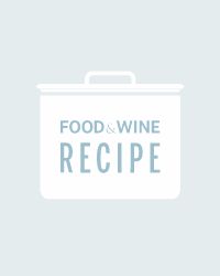 the logo for food and wine recipe on a white box with blue writing in it