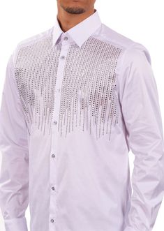 Limited edition- One of a kind Eye-catching studded rhinestone detailed shirt. A modern shirt with an unexpected edge. This white cotton shirt from Mondo is embellished with silver rhinestone. Looking sharp. Your style status can’t be messed with, and this shirt from Mondo makes that clear. Adorned with silver-tone rhinestones, this piece will toughen up any casual look. Eye-catching rhinestone details French placket Point collar Custom buttons Sleeves with Cufflinks Long sleeves with mitered Ba Long Sleeve Rhinestone Party Shirt, Long Sleeve Shirt With Rhinestones For Party, Long Sleeve Party Shirt With Rhinestones, Fitted Long Sleeve Rhinestone Shirt, Fitted Long Sleeve Shirt With Rhinestones, Designer Embellished Party Shirt, Fitted Shirt With Rhinestones For Party, Fitted Party Shirt With Rhinestones, Elegant Party Shirt With Rhinestones