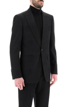 This tuxedo jacket is a mix of classic elegance and modern style, perfect for the man who appreciates subtle details. It's designed for a sleek fit, offering a confident and sophisticated look for any special occasion. Crafted with care in Italy, this jacket is both stylish and comfortable, making it a staple in any wardrobe. Made from a luxurious blend of wool and cotton cady Features a unique tone-on-tone jacquard coat of arms design Satin-covered peaked lapels add a touch of refinement Comfor Jacquard Coat, Jacquard Jacket, Tuxedo Jacket, Leather Cap, Denim Pant, Roberto Cavalli, Coat Of Arms, Denim Top, Victoria Beckham