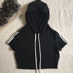 Nwot Black Cropped Pullover Hoodie Size M Short Sleeve With White Stripes On Sleeve Stretchy Material Smoke Free Home Will Ship Priority Mail Within 24 Hours Of Purchase! Trendy Hooded Top With Ribbed Cuffs, Trendy Hooded Tops With Ribbed Cuffs, Spring Black Hoodie With Double-lined Hood, Black Sweatshirt With Double-lined Hood For Spring, Hooded Tops With Double-lined Hood For Streetwear, Hooded Top With Double-lined Hood For Streetwear, Trendy Streetwear Tops With Adjustable Hood, Casual Hoodie With Double-lined Hood, Sporty Hooded Top With Adjustable Hood