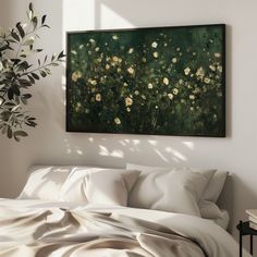 a painting hanging above a bed in a room with white sheets and pillows on it