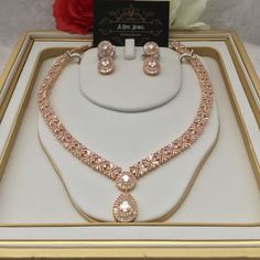 Sparkle and shine like never before with the range of cz diamanté cubic zirconia gold plated 2pcs bridal necklace set with matching earrings. This beautiful cubic zirconia encrusted necklace set is the perfect accessory  for your wedding day. Beautiful elegant, this gold cubic zirconia necklace set is filled with the dazzling sparkle. Guaranteed to transform your look in seconds to gain instant luxury, this stunning necklace set will ensure you steal every spotlight. Bring the dazzle into your o Luxury Gold Bridal Necklace With Diamante, Luxury Gold Jewelry Sets For Marriage, Luxury Yellow Gold Bridal Necklace With Cubic Zirconia, Luxury Gold Bridal Necklace For Rituals, Luxury Yellow Gold Cubic Zirconia Bridal Necklace, Luxury Yellow Gold Bridal Necklace For Wedding, Luxury Gold Plated Bridal Necklace, Luxury Gold Bridal Necklace With Brilliant Cut, Luxury Gold Bridal Necklace For Festive Season