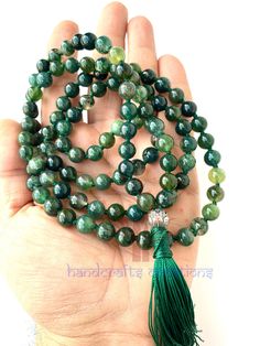 Hare Krishna ✅With the Brand Name of HANDCRAFTS CREATIONS✅ 🌱Beautiful Natural 8mm Moss Agate Stones Japa mala | Necklace | Prayer Beads Mala🌱 ❣️You never see this unbreakable quality of closing knots.  ✅This beautiful Moss Agate Stone Beads mala is hand-knotted on a bright & Shine Green Colour thread to add longevity and comfort during meditation and finished with a Shining German SIlver guru bead and a matching Contrast Green Colour silk tassel.✅ 🌺108 Beautiful Moss Agate Stones 🌿8mm Hand-knotted Japa Mala with Stylish Knotted Finishing with Wax/Parachute Thread to add longevity & comfort during meditation with Unbreakable Quality. Finished With ❤️ German Silver Guru Bead❤️ and with a new finishing, closing knots design. Best product to give someone as a spiritual Gift purpose. ASSURI Adjustable Agate Mala With 8mm Beads, Beaded Agate Mala With Round Beads, Adjustable Green Beaded Necklace With 8mm Beads, Adjustable Agate Mala With Round Beads, Adjustable Agate Hand-strung Mala, Green Polished Beads Mala For Gift, Green Polished Beads Mala As Gift, Adjustable Hand-strung Agate Mala, Green 8mm Beads Mala Gift