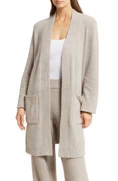 Maximize the coziness of your weekend look in this longline cardigan complete with roomy front pockets. 37 1/2" length (size Medium)   Long sleeves   Front patch pockets   70% recycled polyester, 30% polyester   Machine wash, tumble dry   Imported    This garment was made in a factory that supports women-worker empowerment through HERproject, which creates partnerships to enable workplace-based interventions on health, financial inclusion and gender equality Cheap Casual Forever 21 Cardigan, Open Front Cardigan With Pockets For Loungewear, Spring Sweater Coat For Loungewear With Pockets, Spring Outerwear With Pockets, Relaxed Fit Open Front Cardigan With Pockets, Comfortable Spring Outerwear With Pockets, Comfy Relaxed Fit Outerwear With Pockets, Cozy Cardigan With Pockets For Loungewear, Cozy Loungewear Cardigan With Pockets