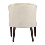 an upholstered white chair with wooden legs