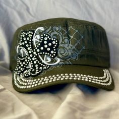 These Hats Are New From Mfg. Beautiful Bling And Stich Work. Each One Has An Adjustable Velcro Back. Color Is Olive Green. Casual Cap With Rhinestones, Casual Rhinestone Cap, Casual Rhinestone Hat, One Size Fits Most, Casual Rhinestone Hat, One Size, Casual Rhinestone Hat One Size Fits Most, Casual Rhinestone Hat, Helen Kaminski Hats, White Beret, Yankees Cap