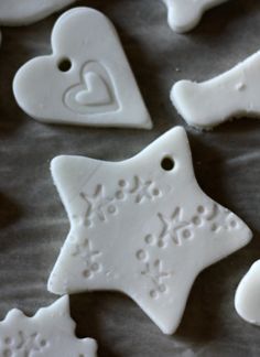 white ceramic ornaments with hearts and stars on them